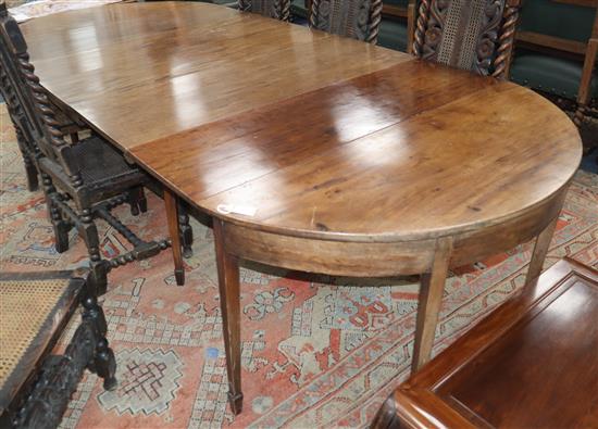 A George III mahogany D end extending dining table W.300cm extended